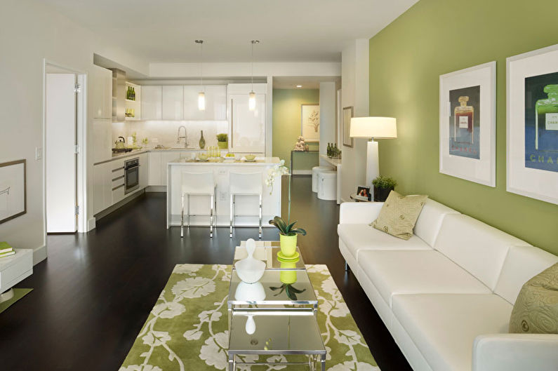 Зеленый цвет в интерьере гостиной - фото