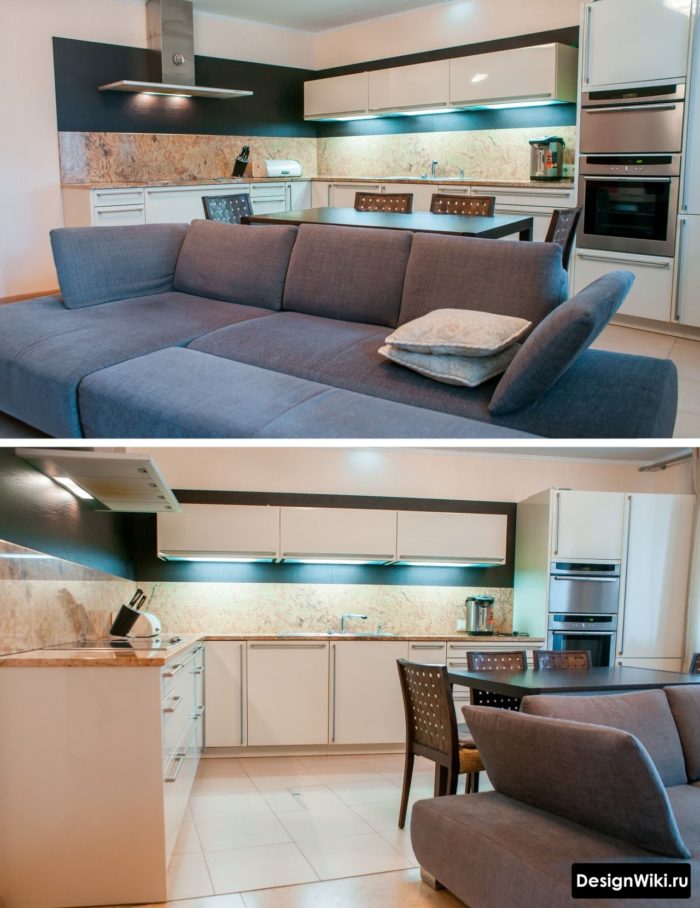 Обеденный стол и диван в современной кухне-гостиной
