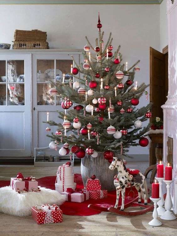 22-a-traditional-nordic-christmas-tree-with-white-red-and-silver-ornaments-and-candy-canes-as-decorations-2400003